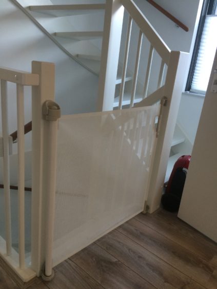 Traphekje oprolbaar aan trap